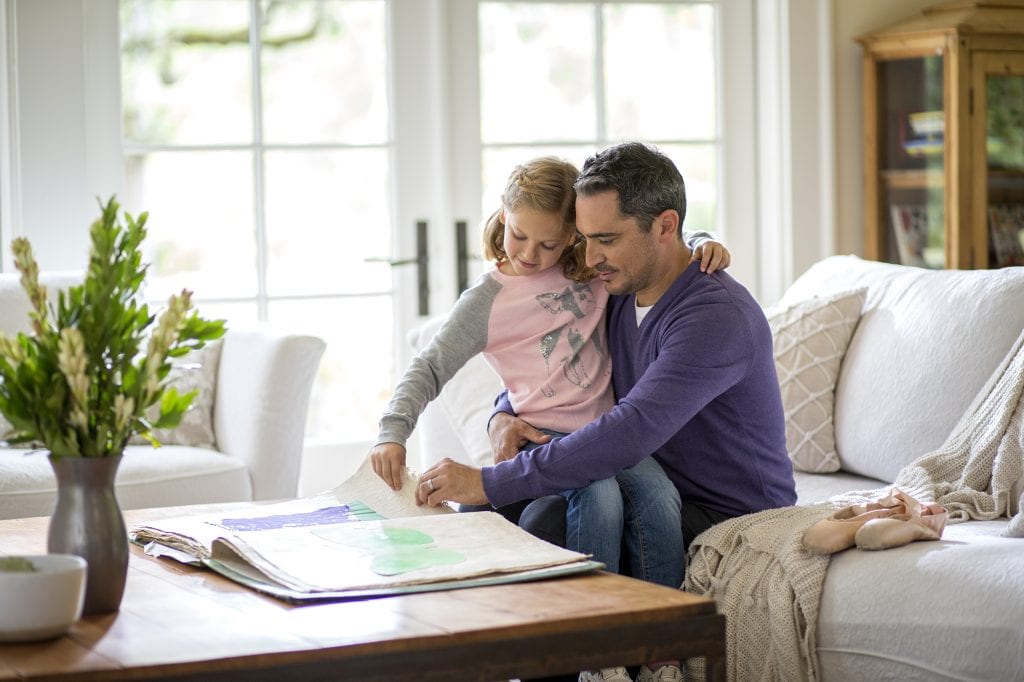 Man sitting with daughter